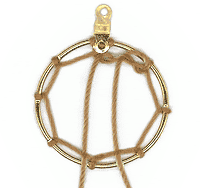 Step 3 - Finishing the first row of cord in the hoop